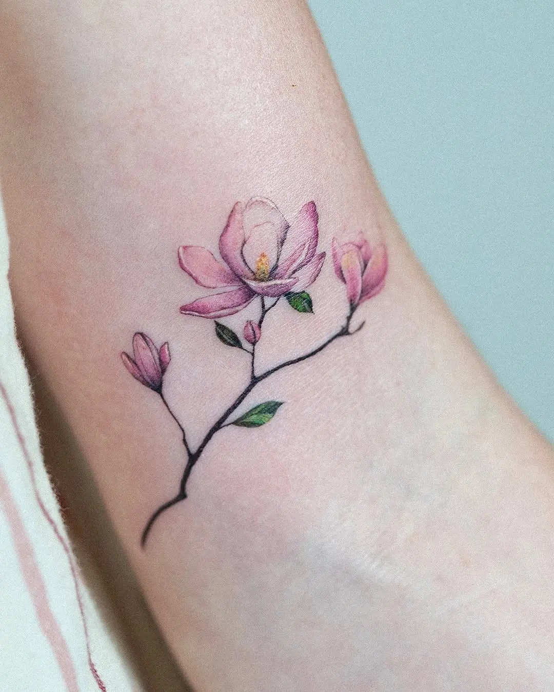 Delicate Magnolia Tattoo on Ankle
