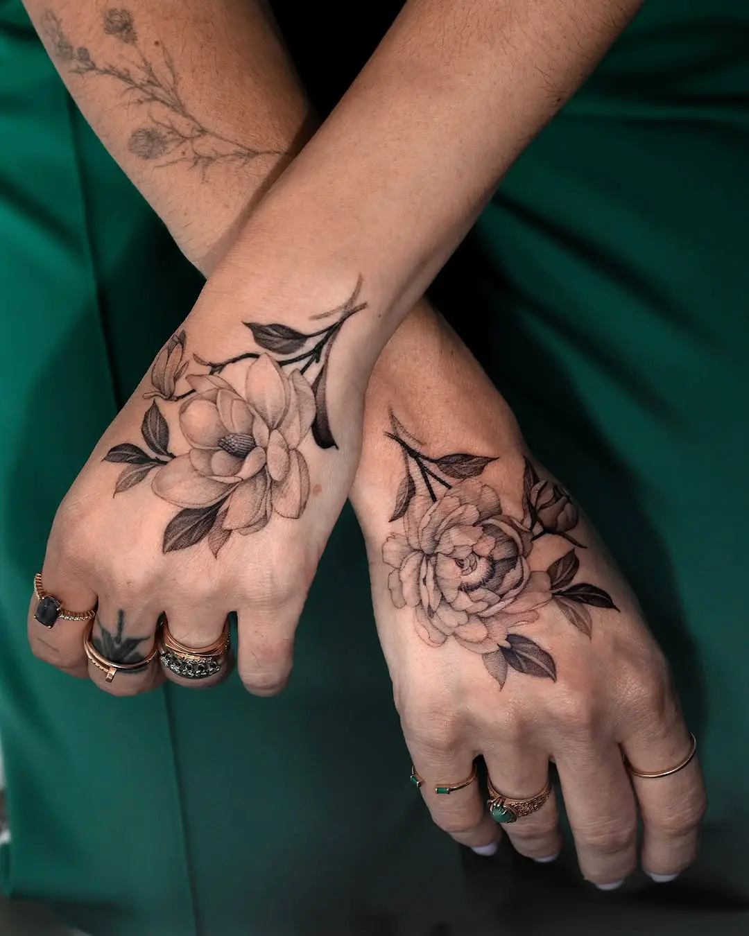 Elegant Magnolia Tattoos on Hands