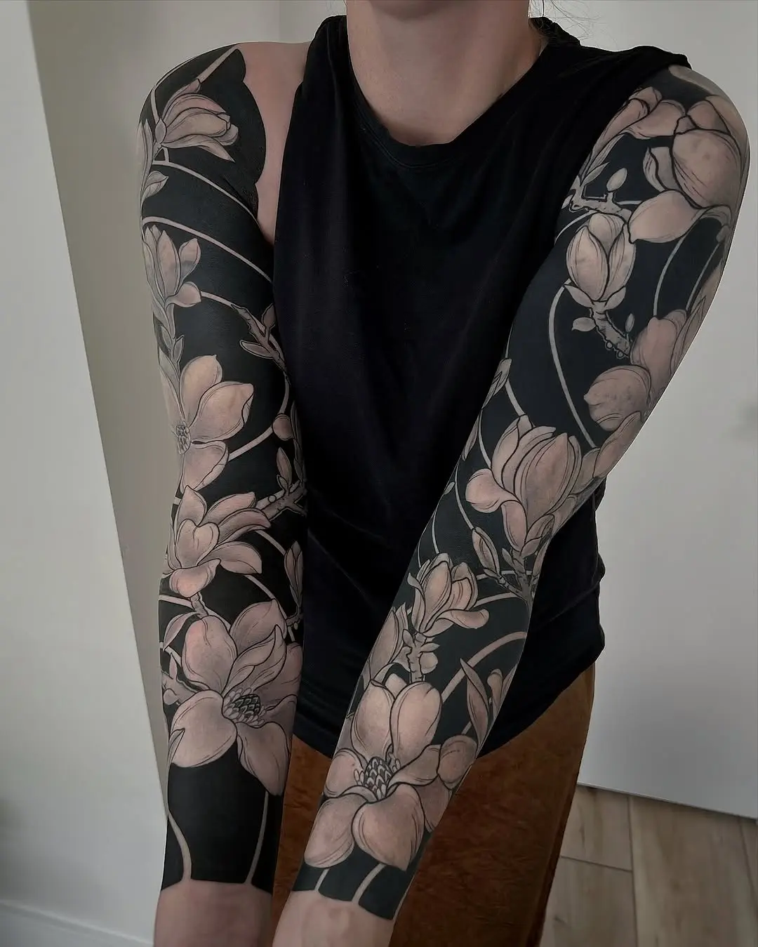 Beautifully intricate magnolia sleeve tattoos