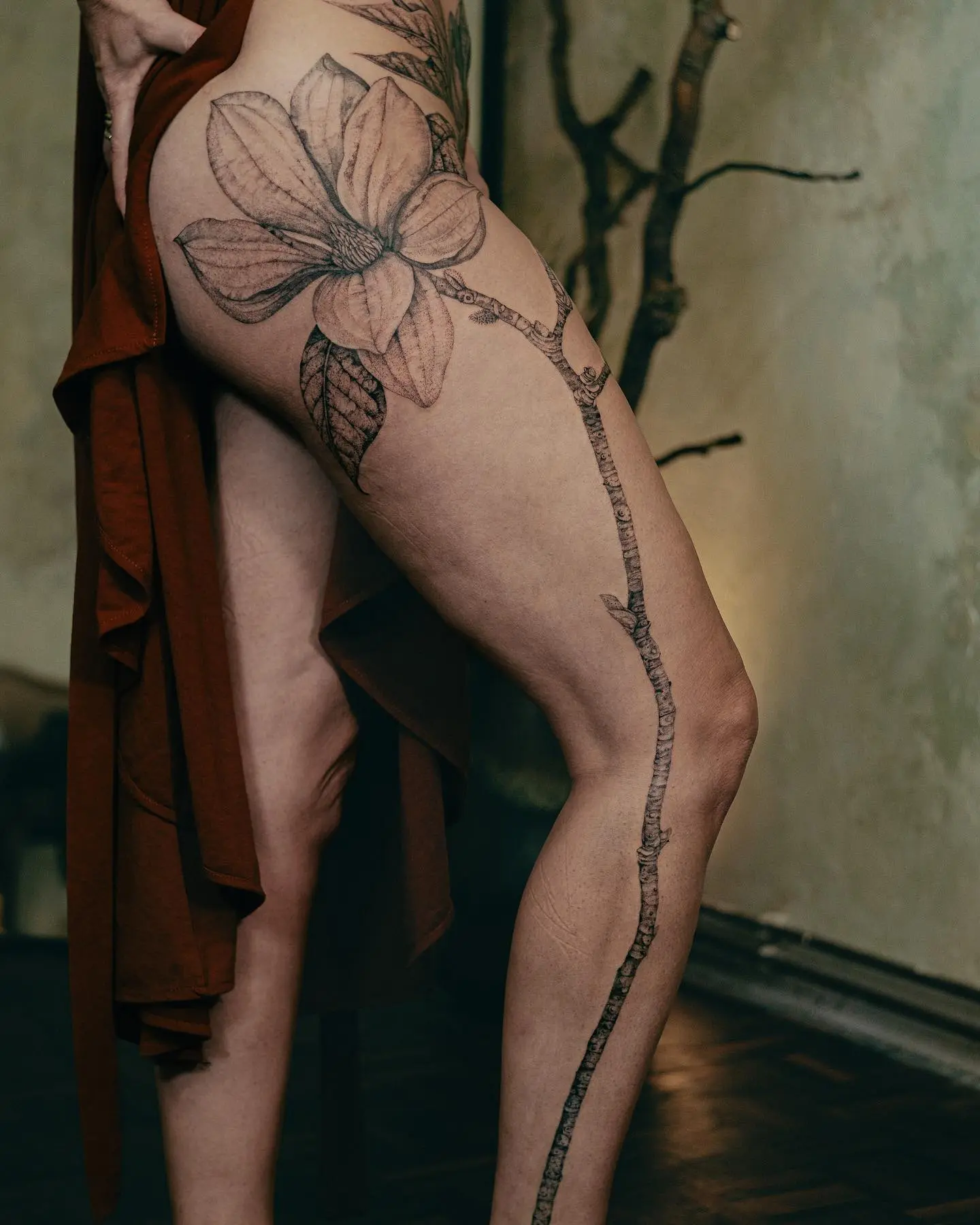 Elegant Magnolia Tattoo on Woman's Leg