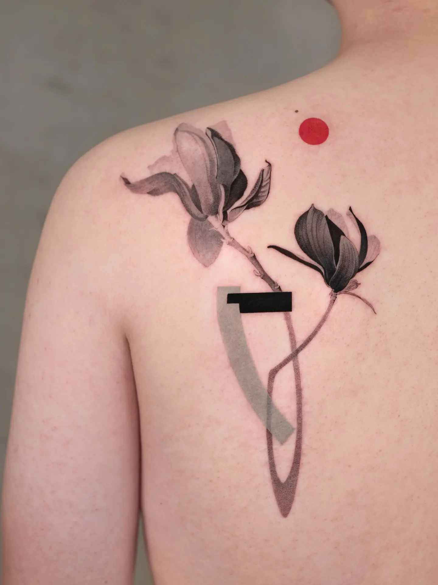 Elegant Magnolia Tattoo with Abstract Features