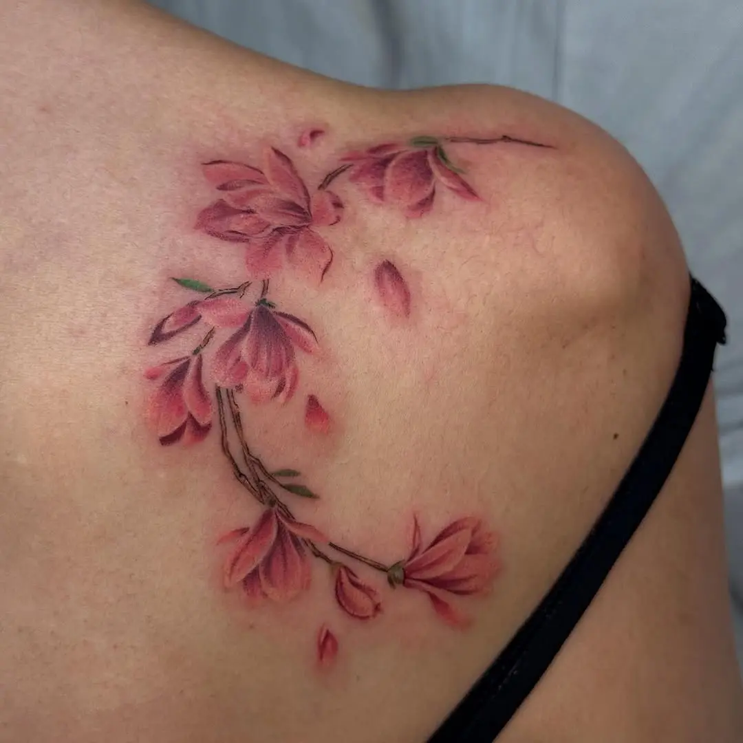 Stunning magnolia tattoo on shoulder
