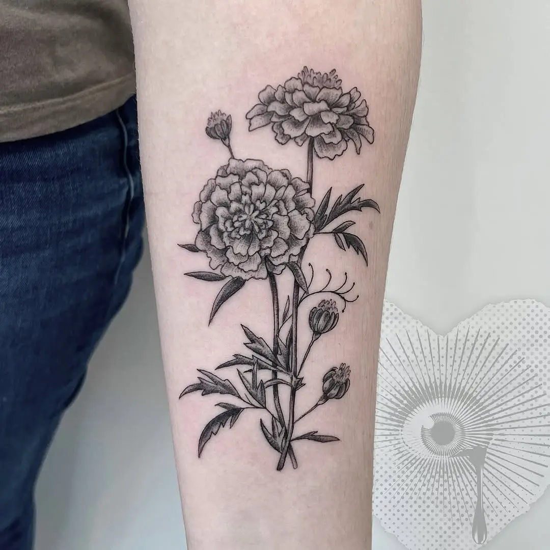 Elegant black ink marigold flower tattoo design