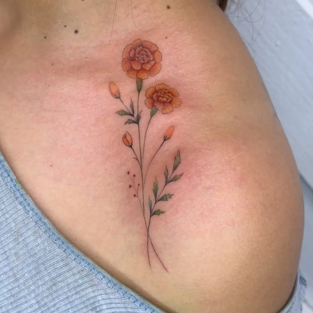 Elegant marigold tattoo exuding vibrant floral beauty