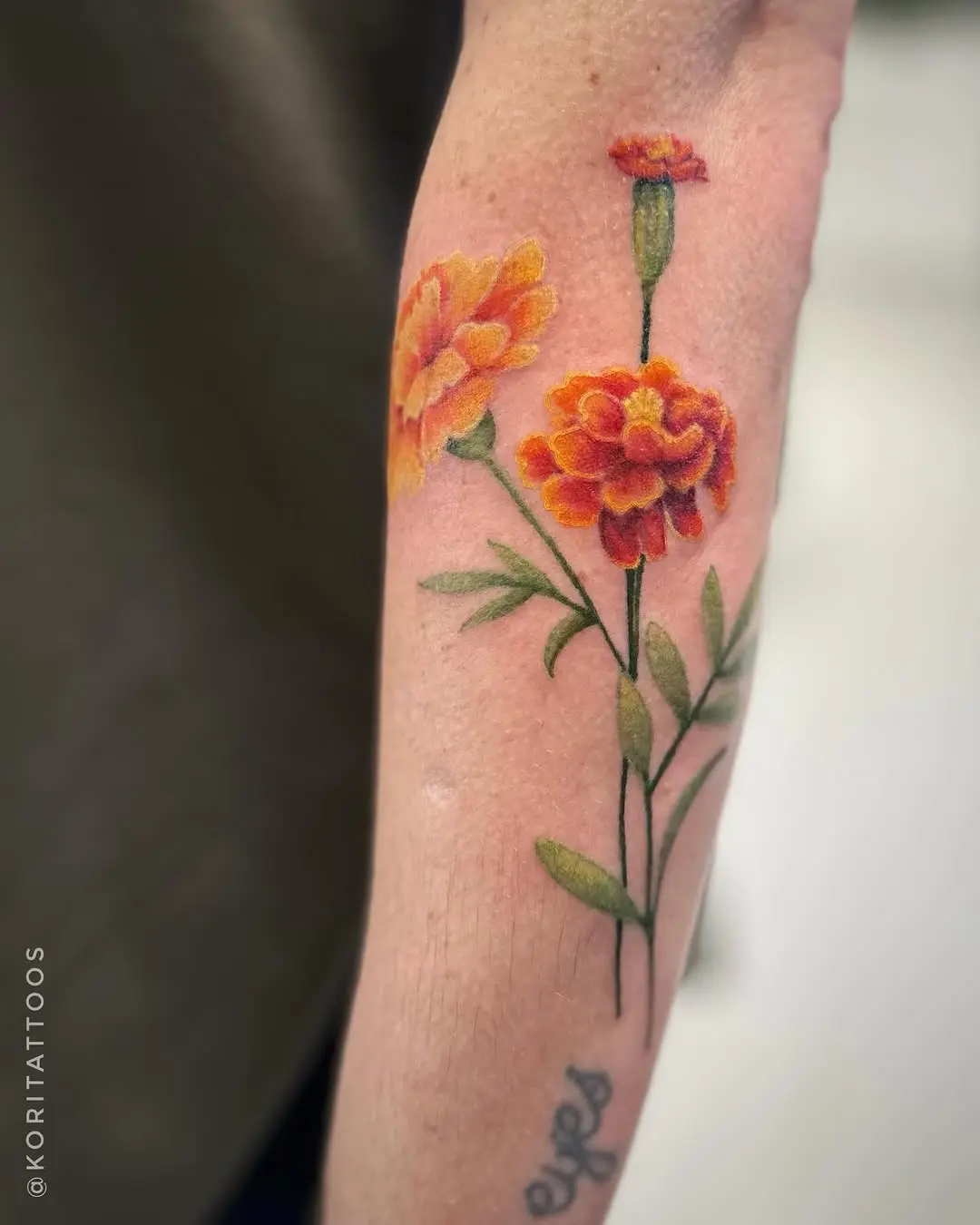 Stunning Marigold Tattoo with Bold Colors