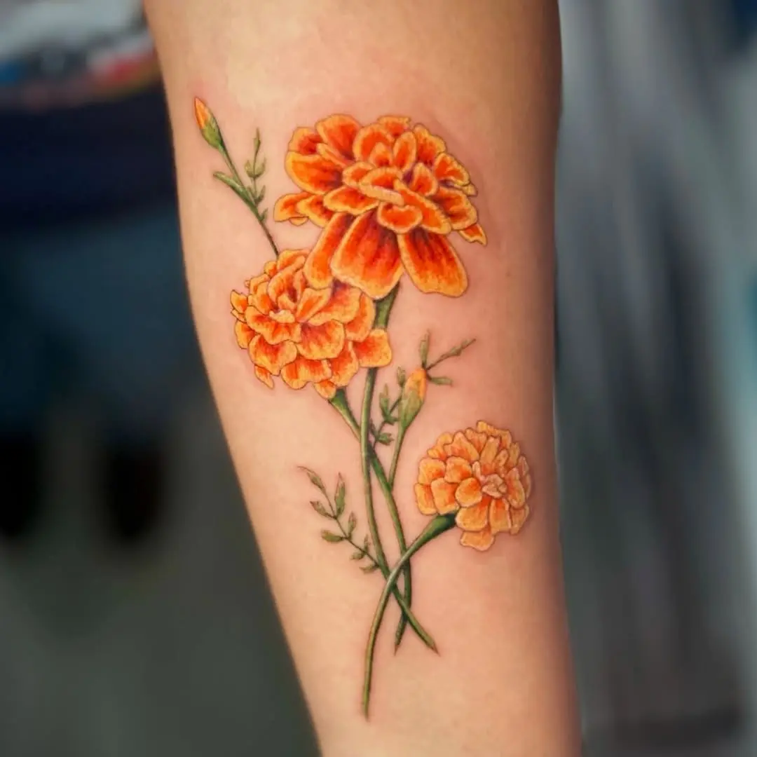 Vibrant marigold tattoo showcasing elegance and beauty