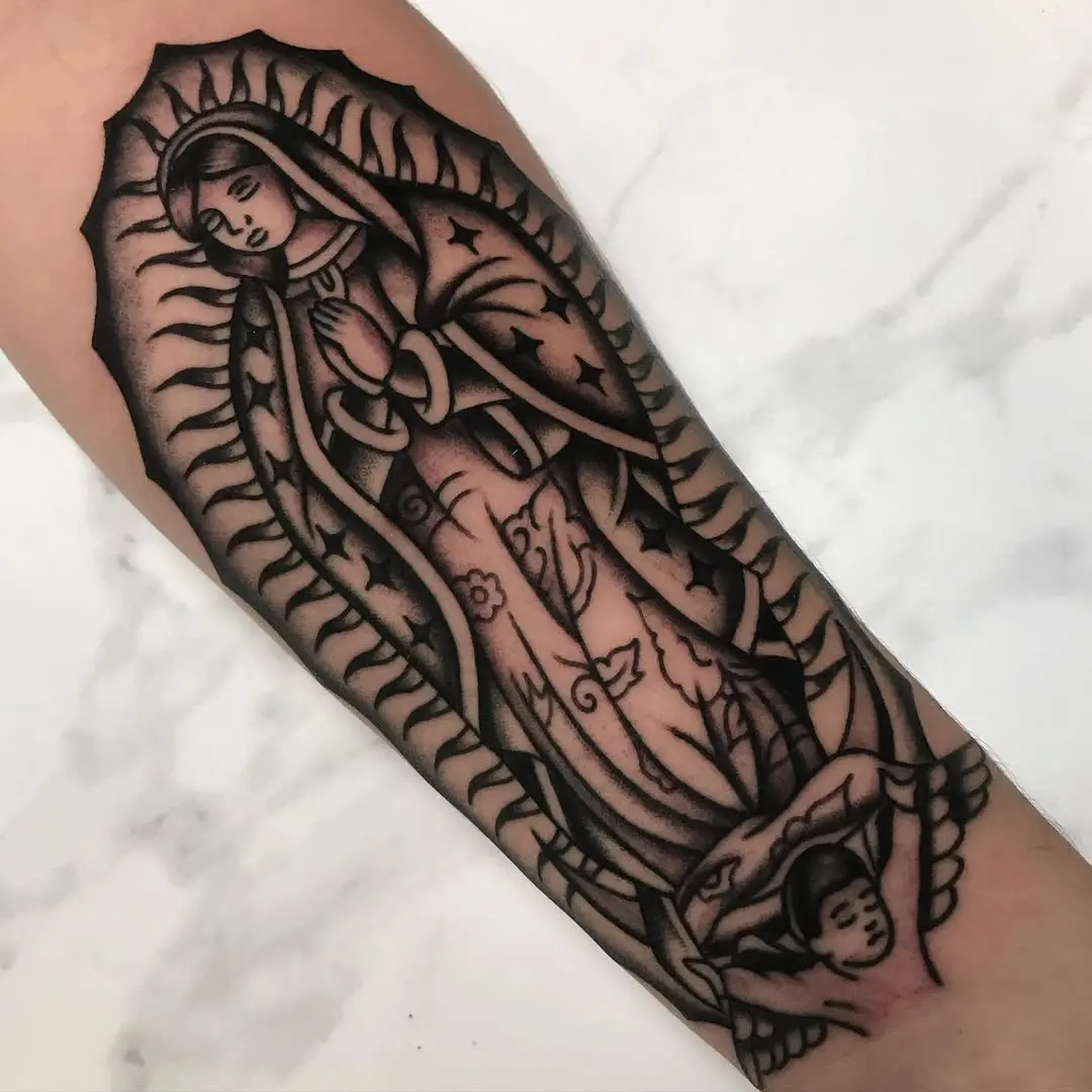 Elegant Virgin Mary tattoo with intricate details