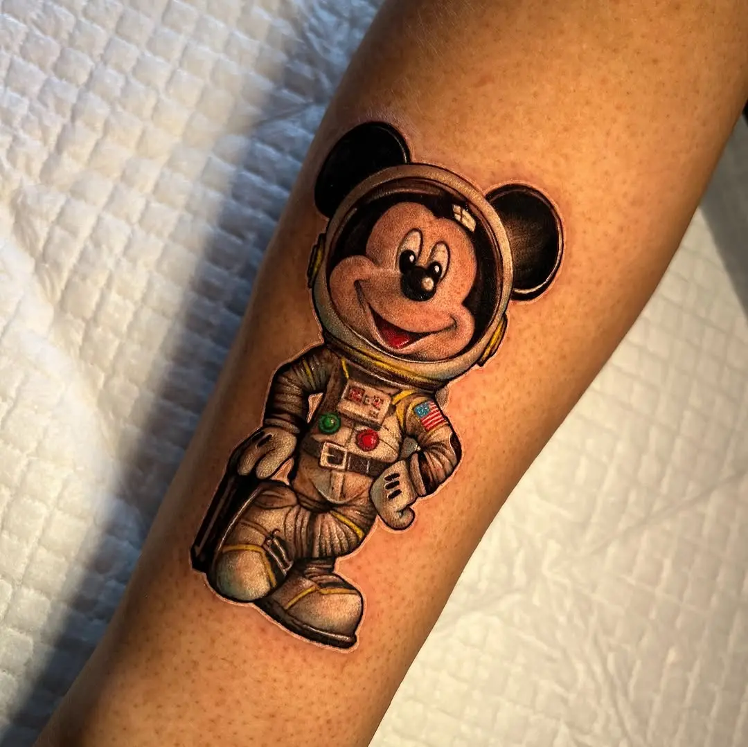 Playful Mickey Mouse in Space Suit Tattoo