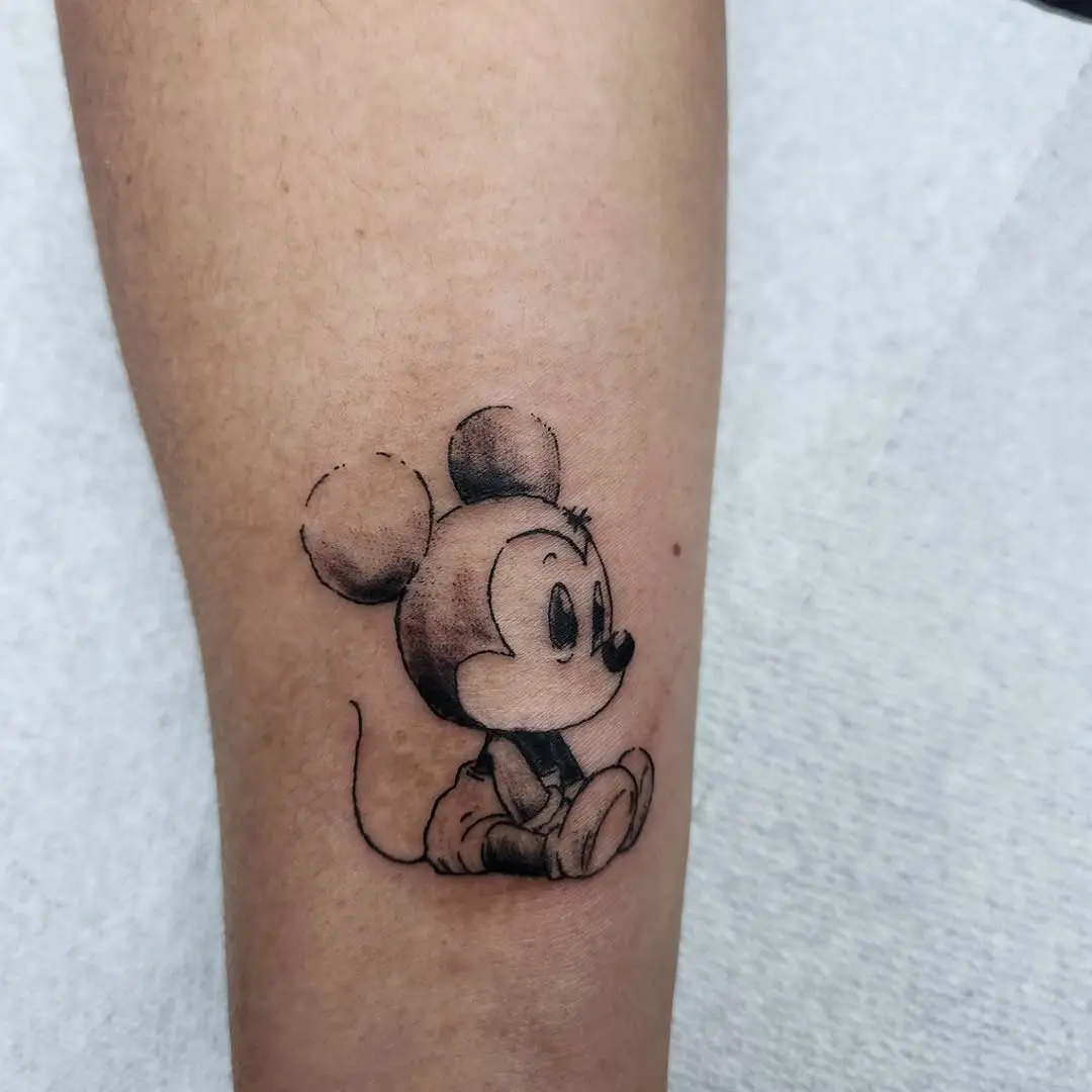 Whimsical Mickey Mouse Tattoo in Vintage Style