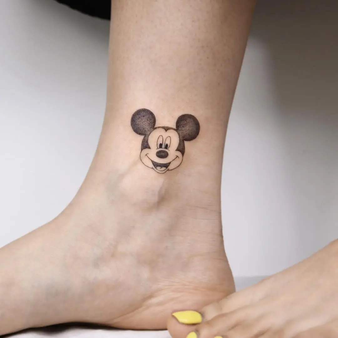 Charming Mickey Mouse tattoo on ankle area
