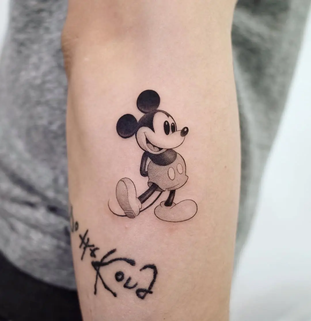 Classic Mickey Mouse tattoo with playful vibes
