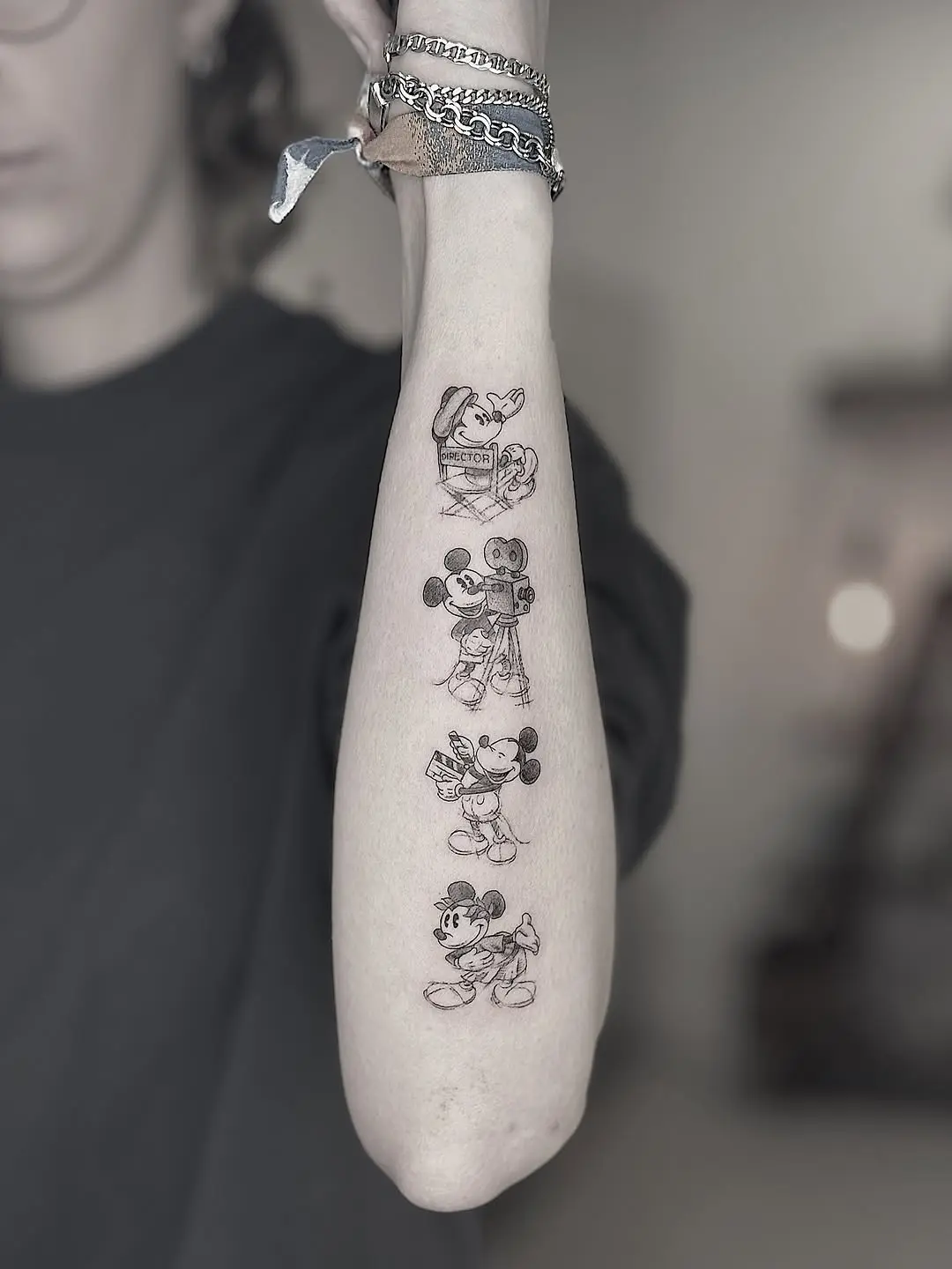 Charming Mickey Mouse tattoo designs in black ink