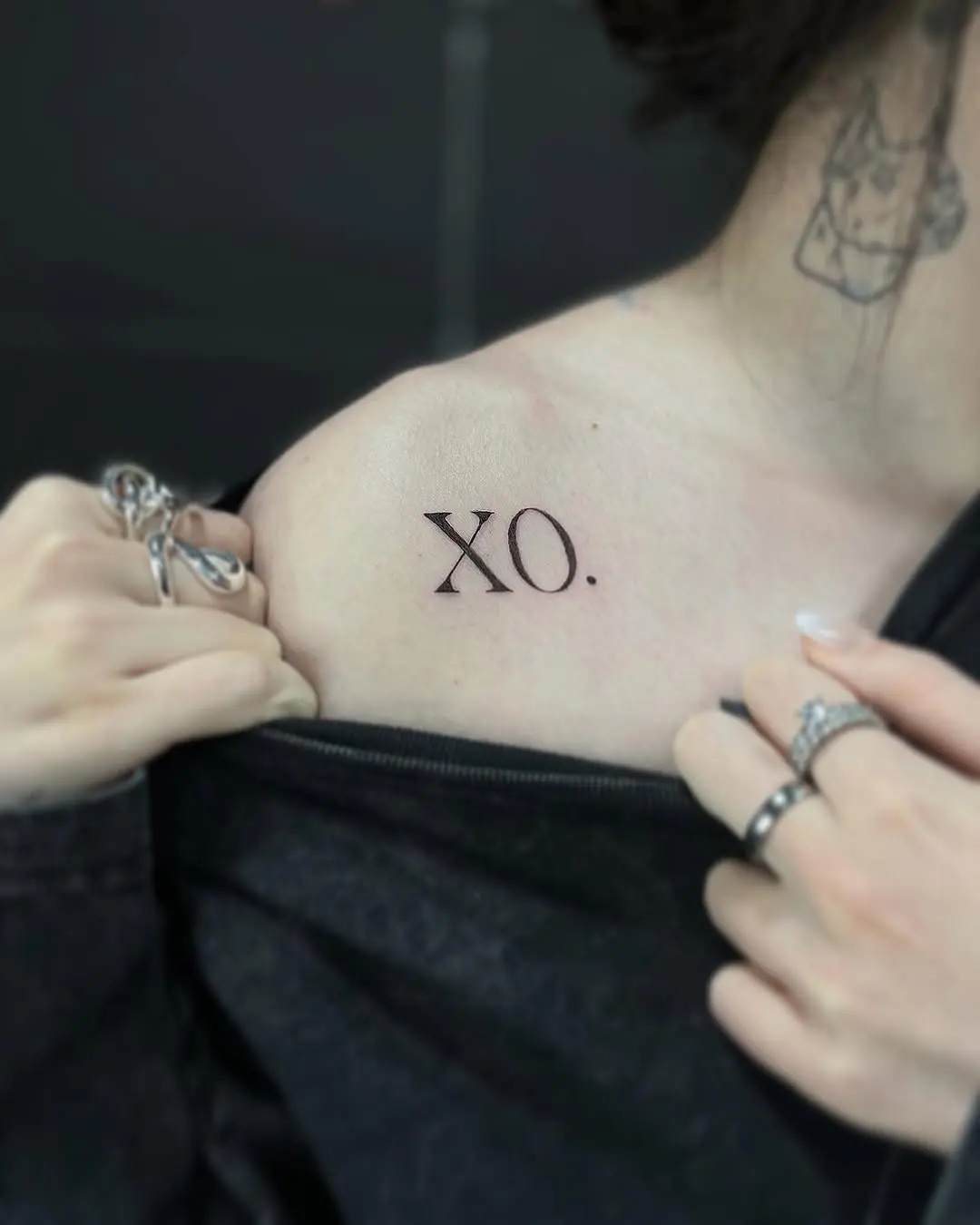 Minimalist XO Tattoo on the Shoulder
