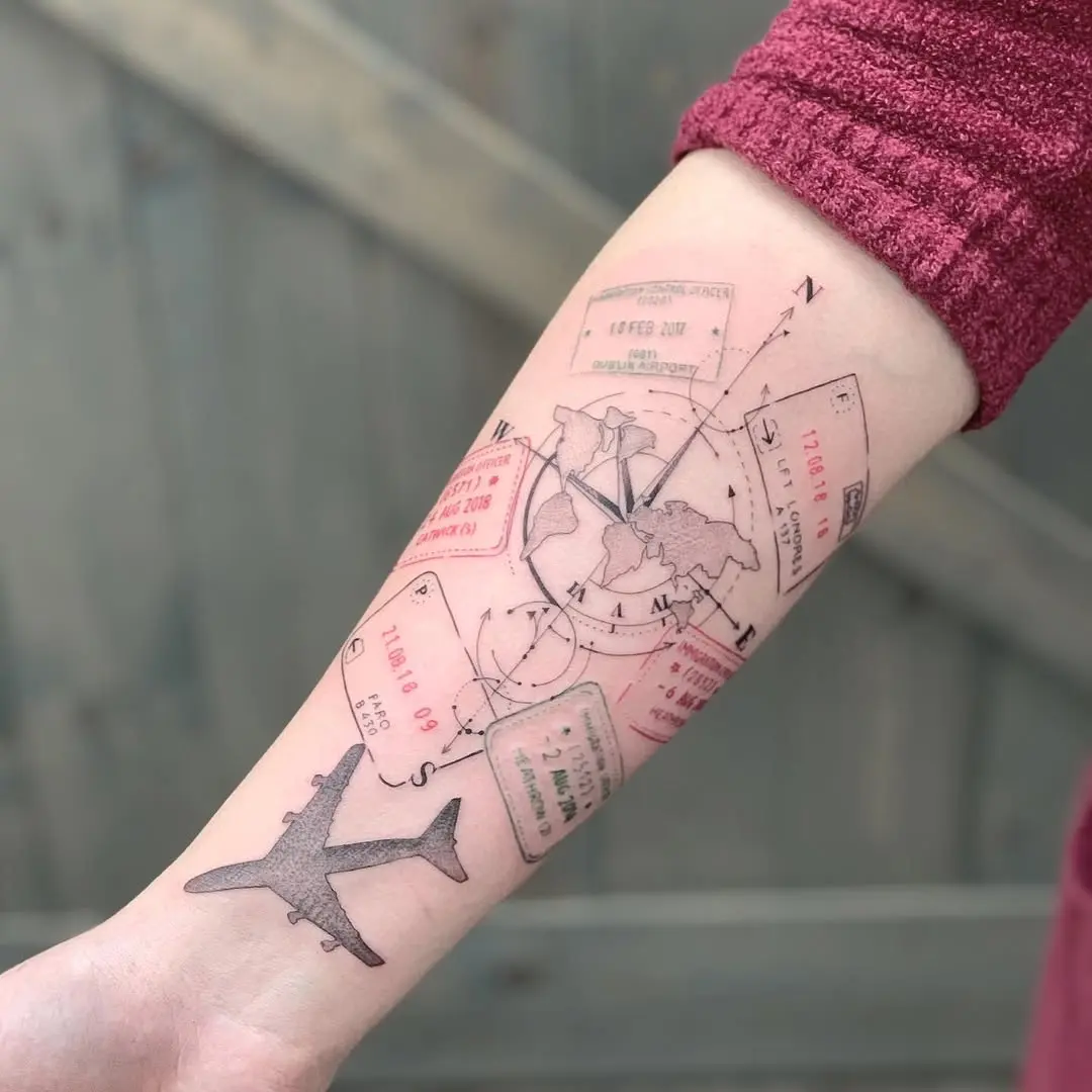 Intricate Travel-Themed Tattoo on Forearm