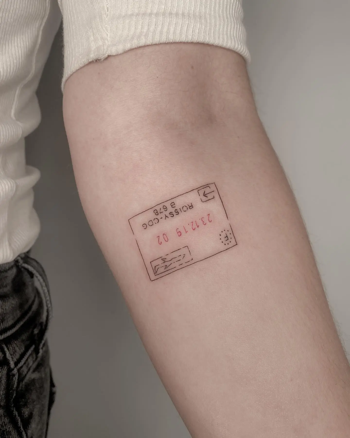 Creative Passport Tattoo on the Arm