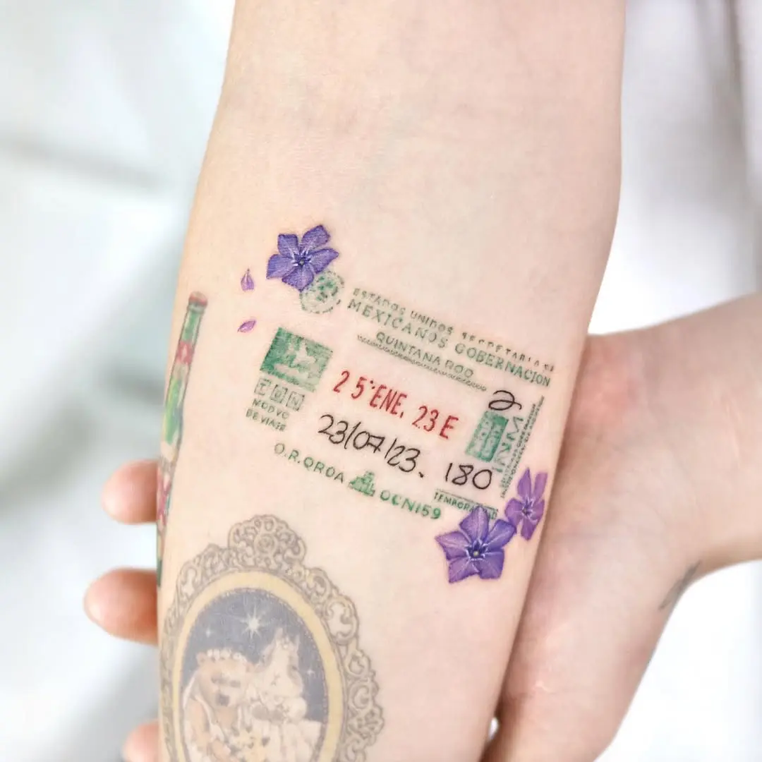 Creative passport tattoo with floral accents