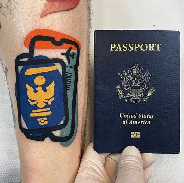 Bold passport tattoo showcasing travel spirit