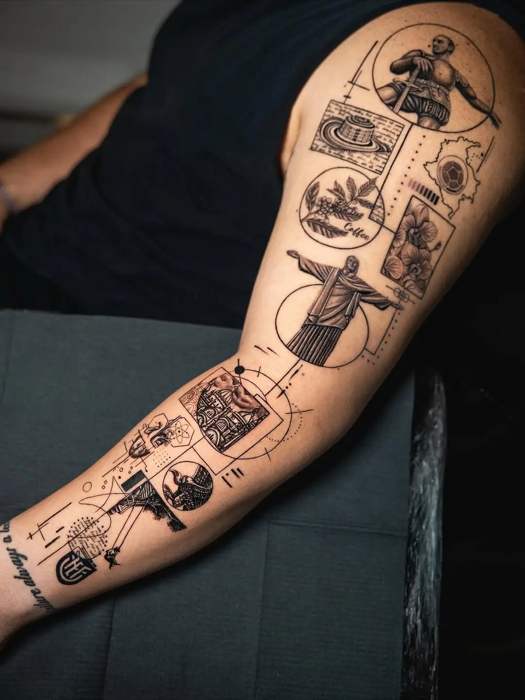 Creative passport-themed tattoos on an arm
