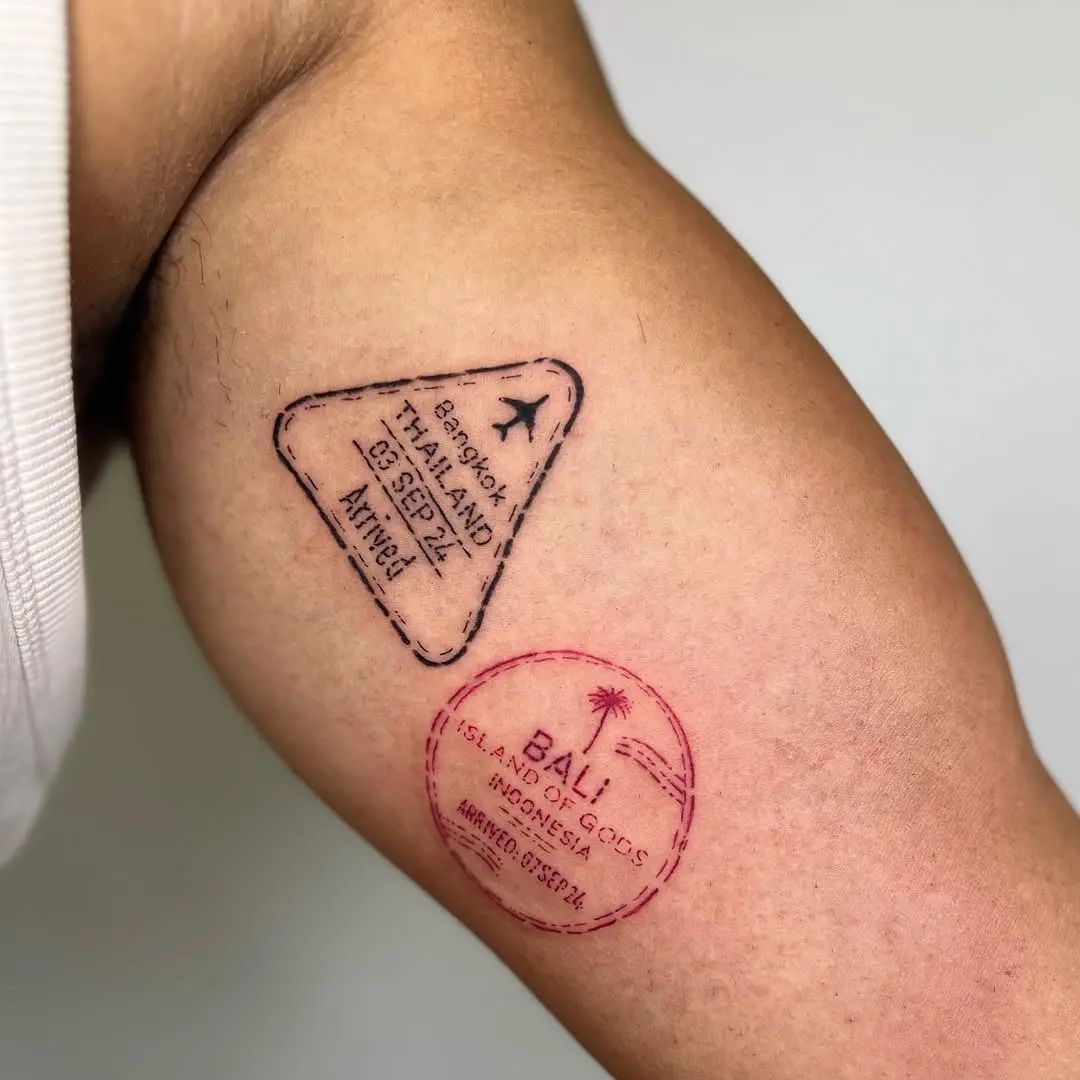Creative passport tattoos showcasing travel adventures