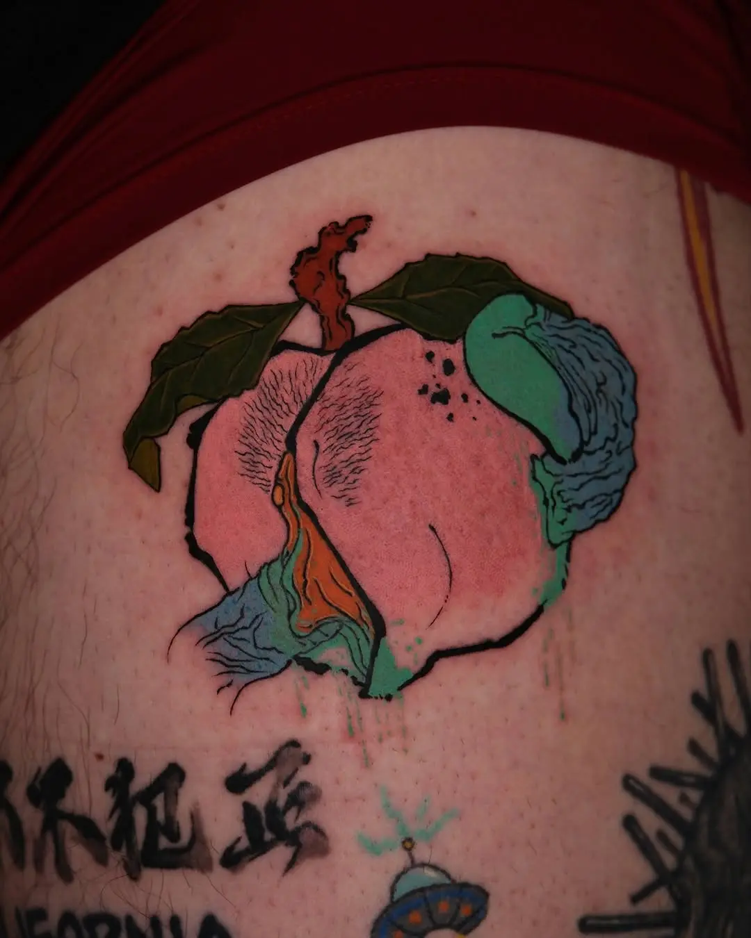 Vivid Peach Tattoo with Unique Design Elements