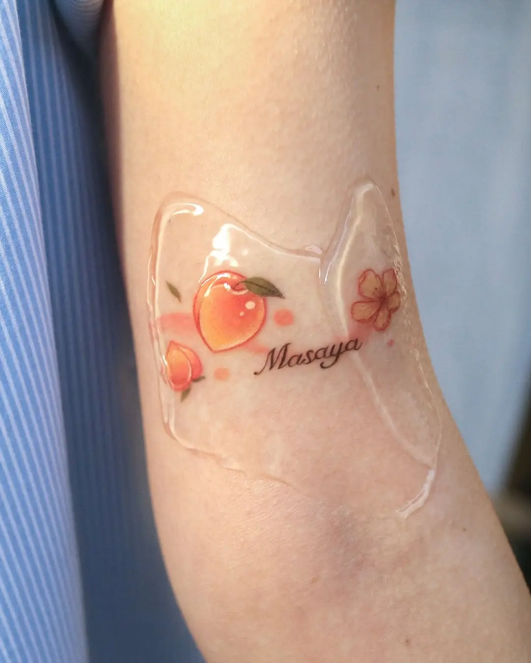 Charming Peach Tattoo with a Personal Touch