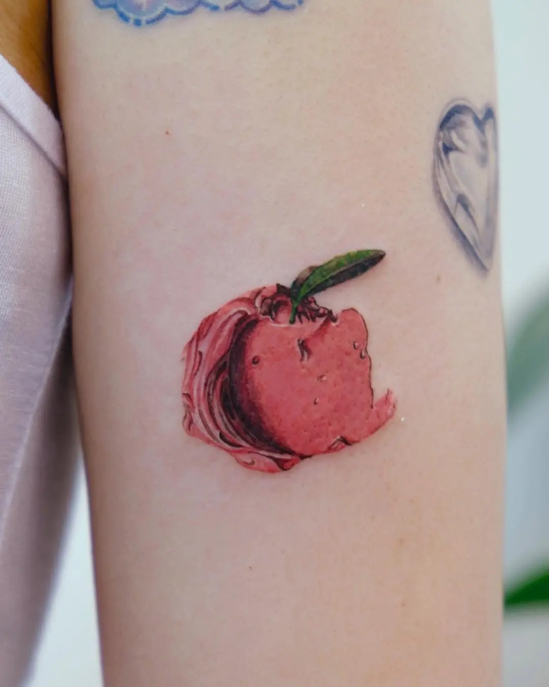 Vibrant Peach Tattoo with Unique Texture