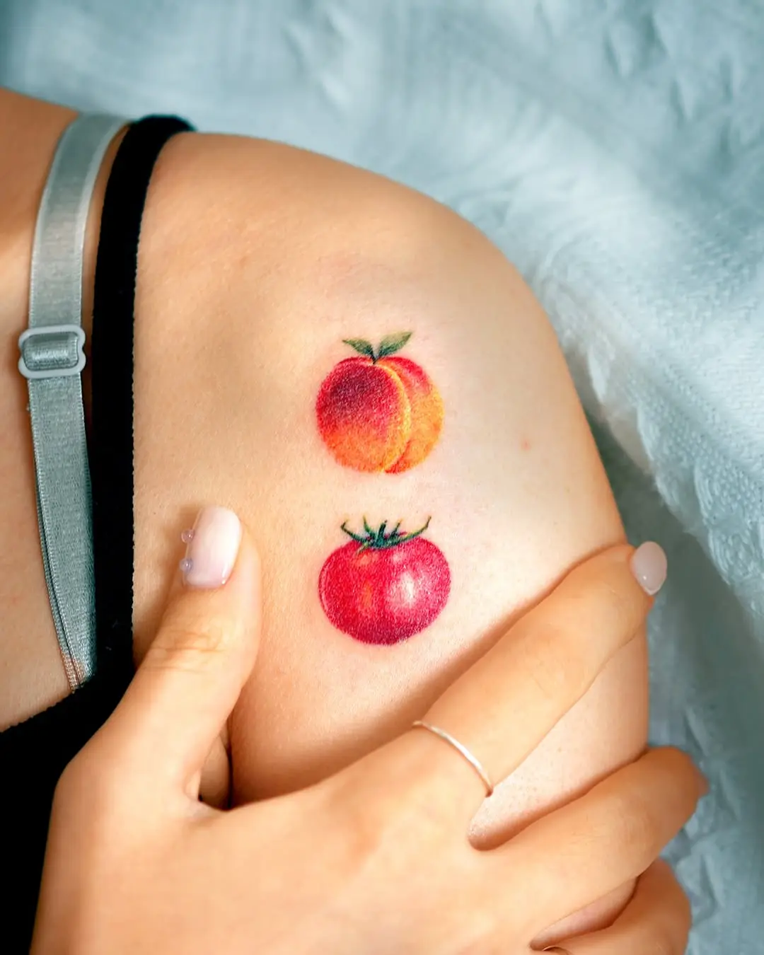 Vibrant peach and tomato tattoos for fresh vibes