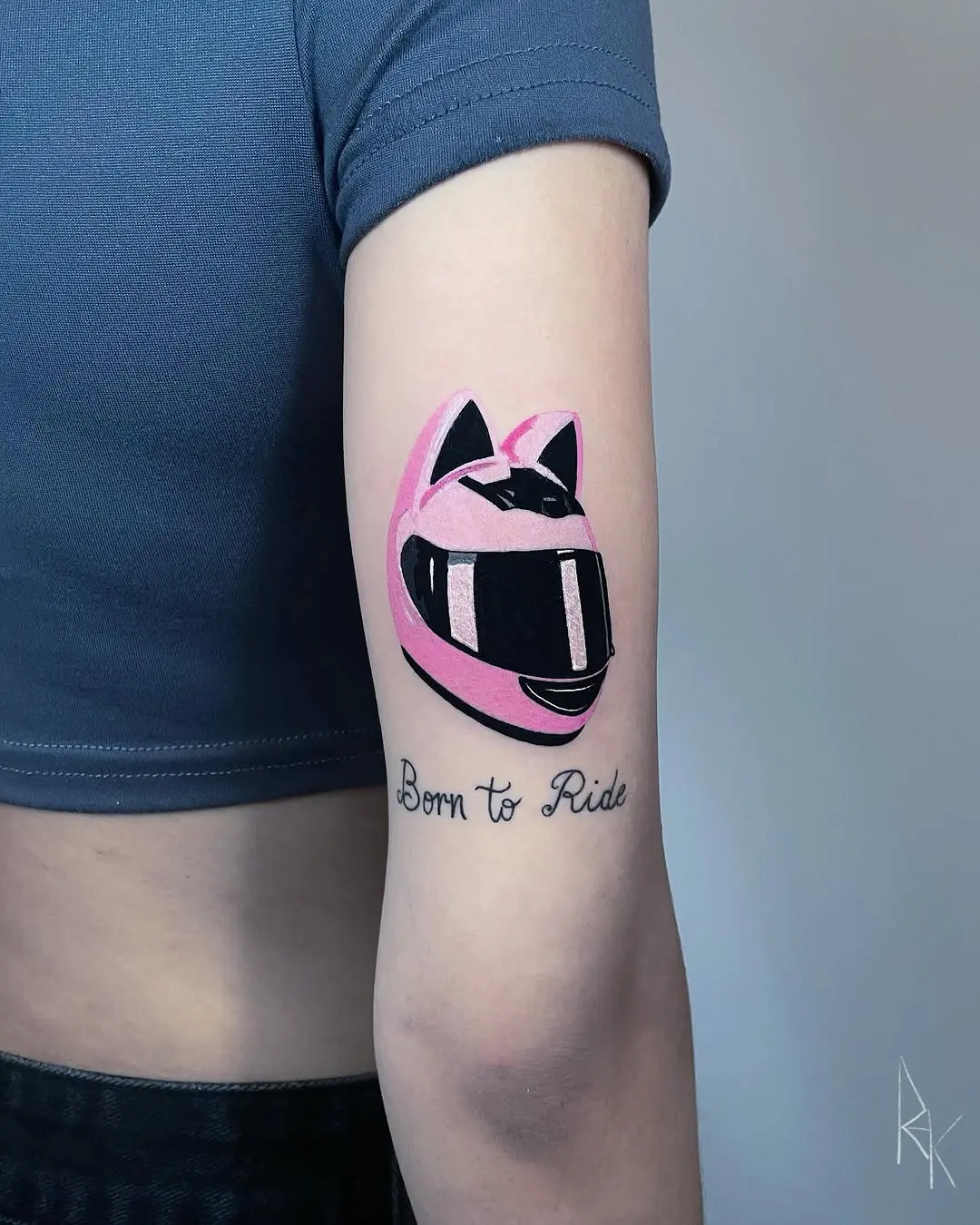 Stylish pink helmet tattoo with bold text