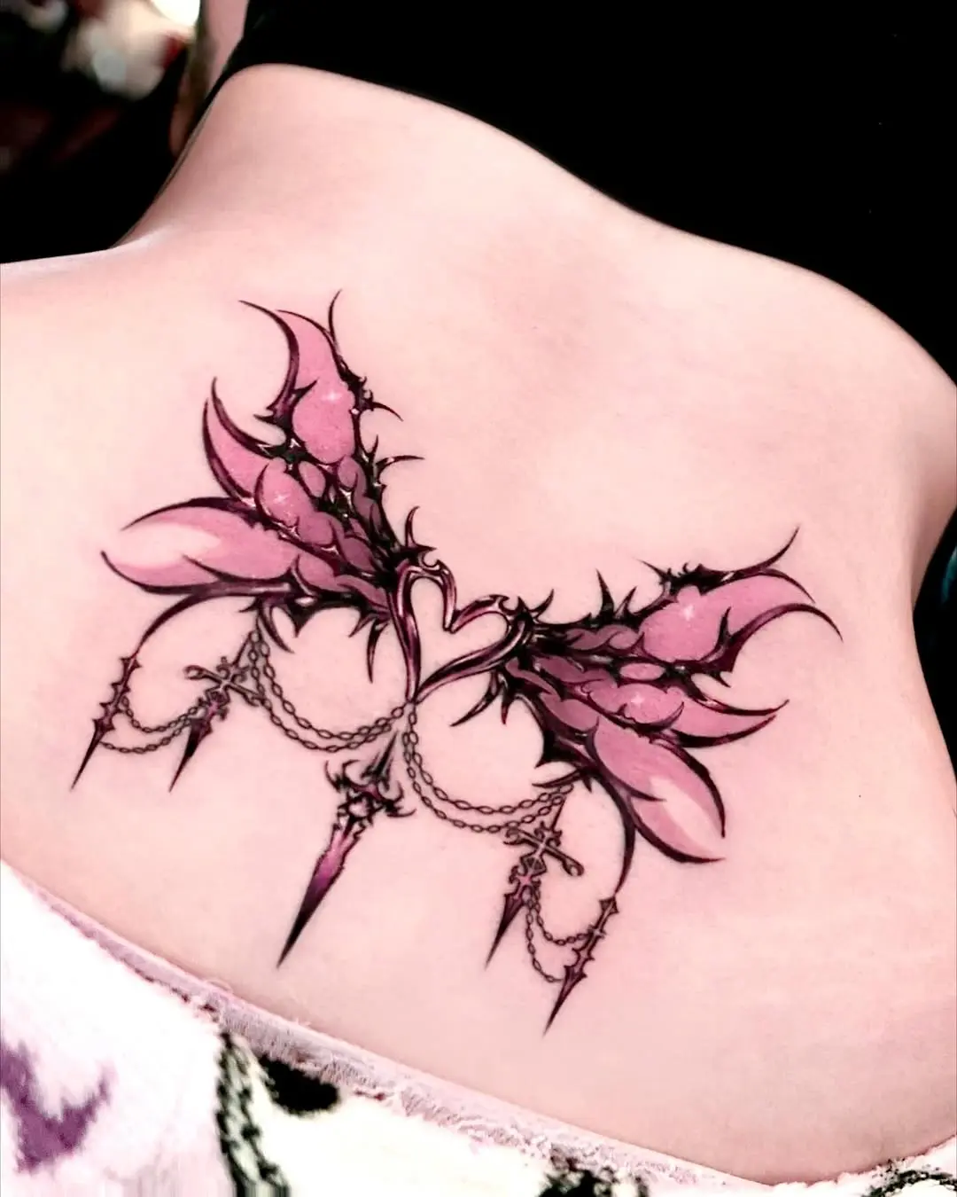Elegant pink wings with edgy spikes detail