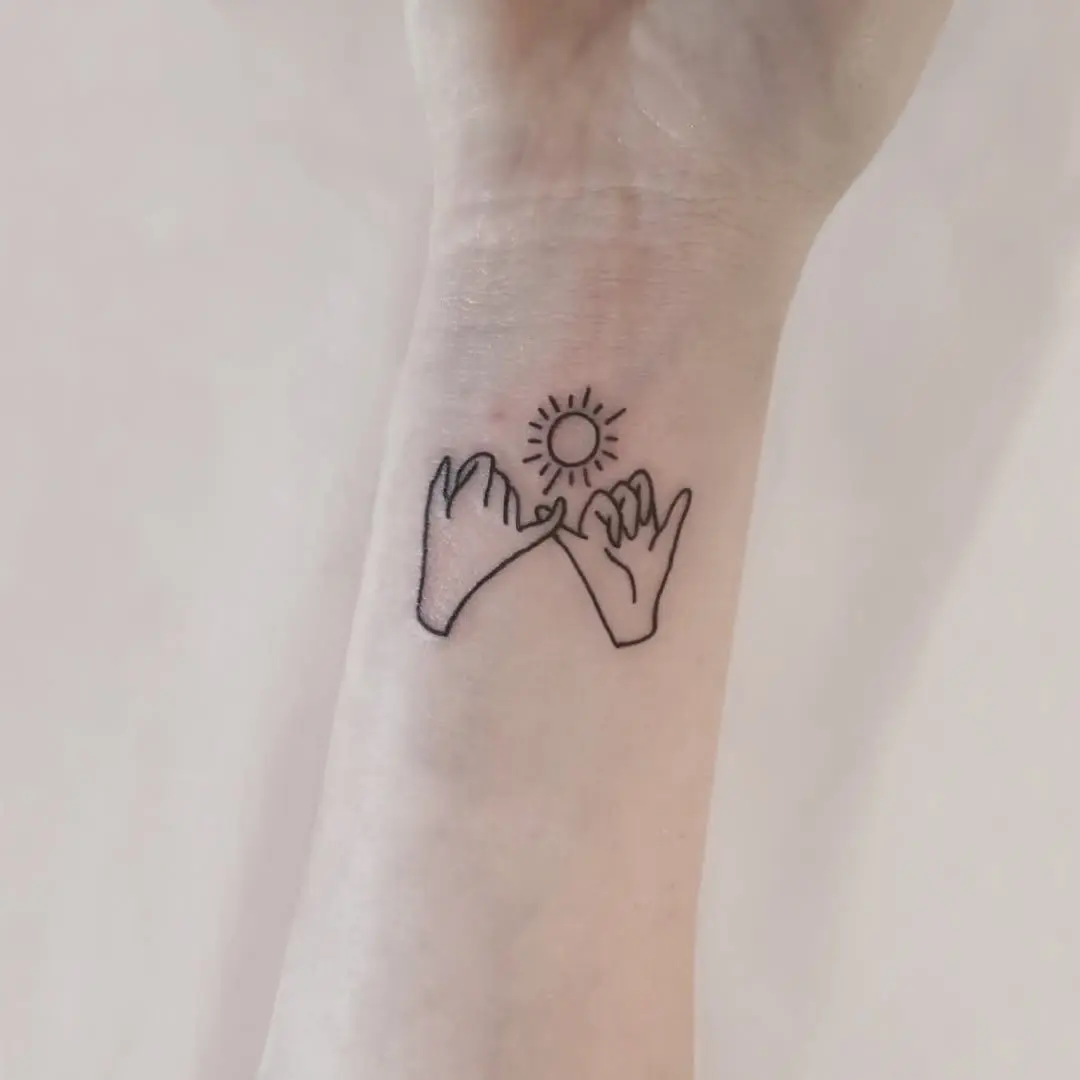Meaningful pinky promise with a sunny vibe