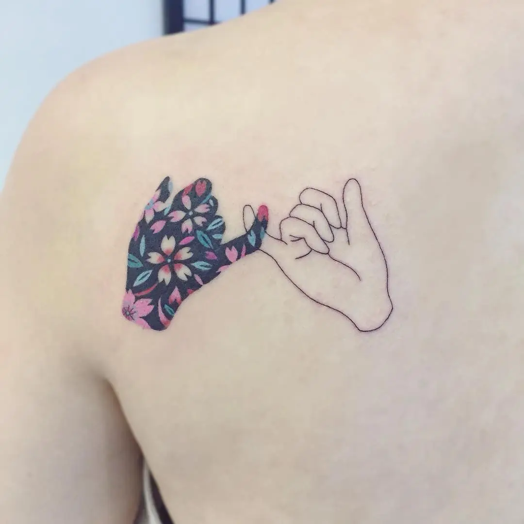 Colorful floral pinky promise tattoo design