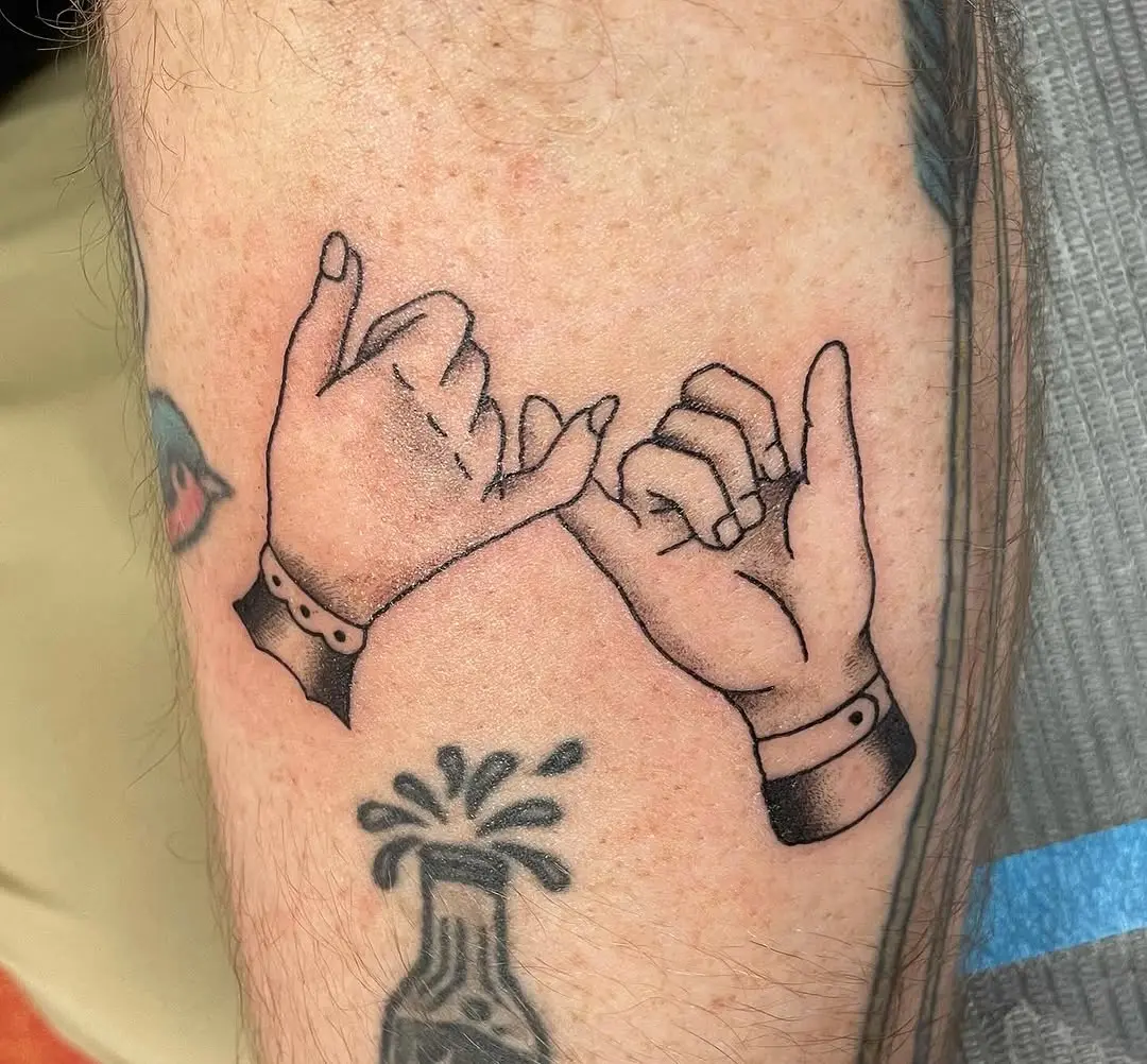 Symbolic pinky promise tattoo design on skin