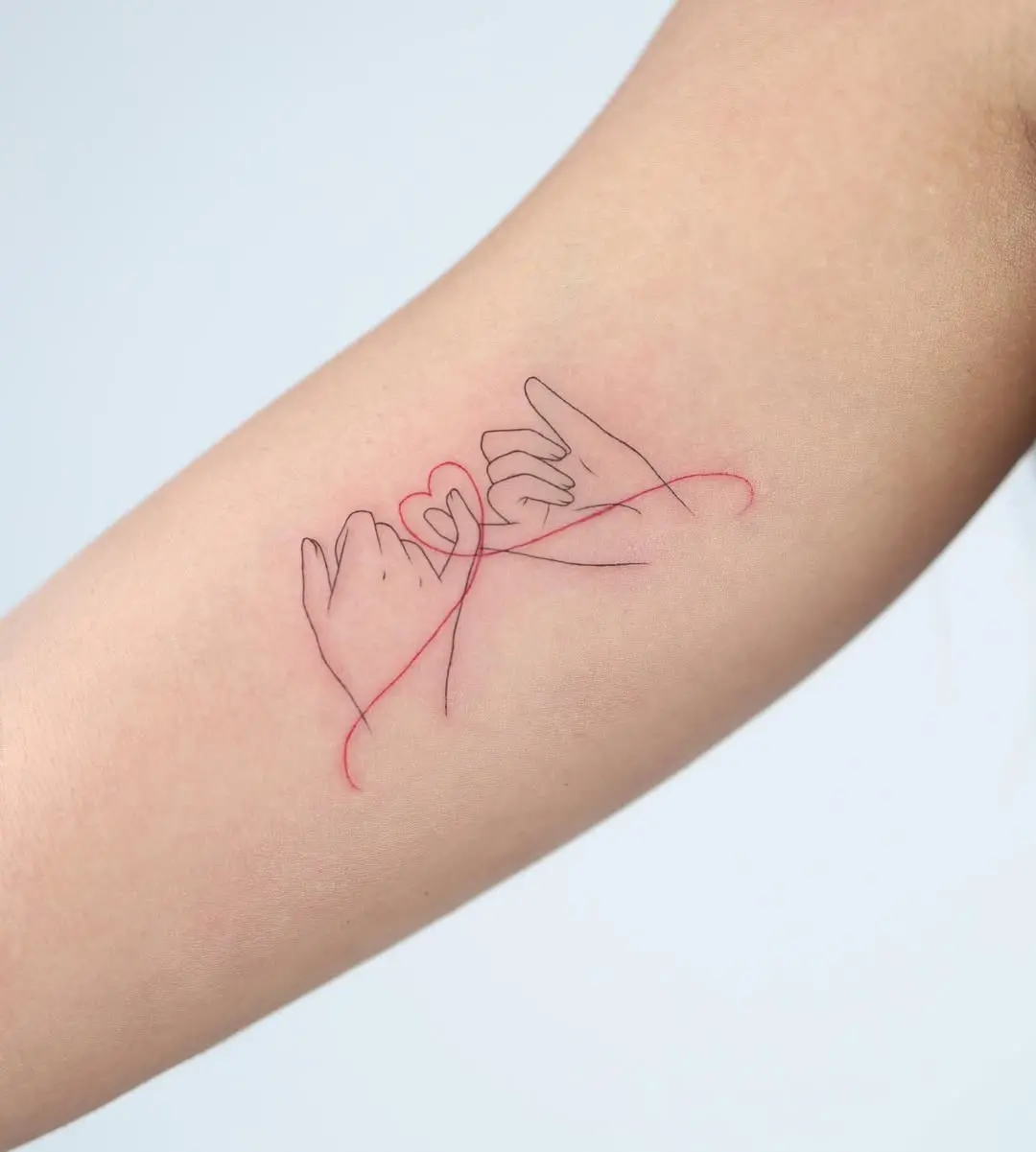 Meaningful pinky promise tattoo design inspiration