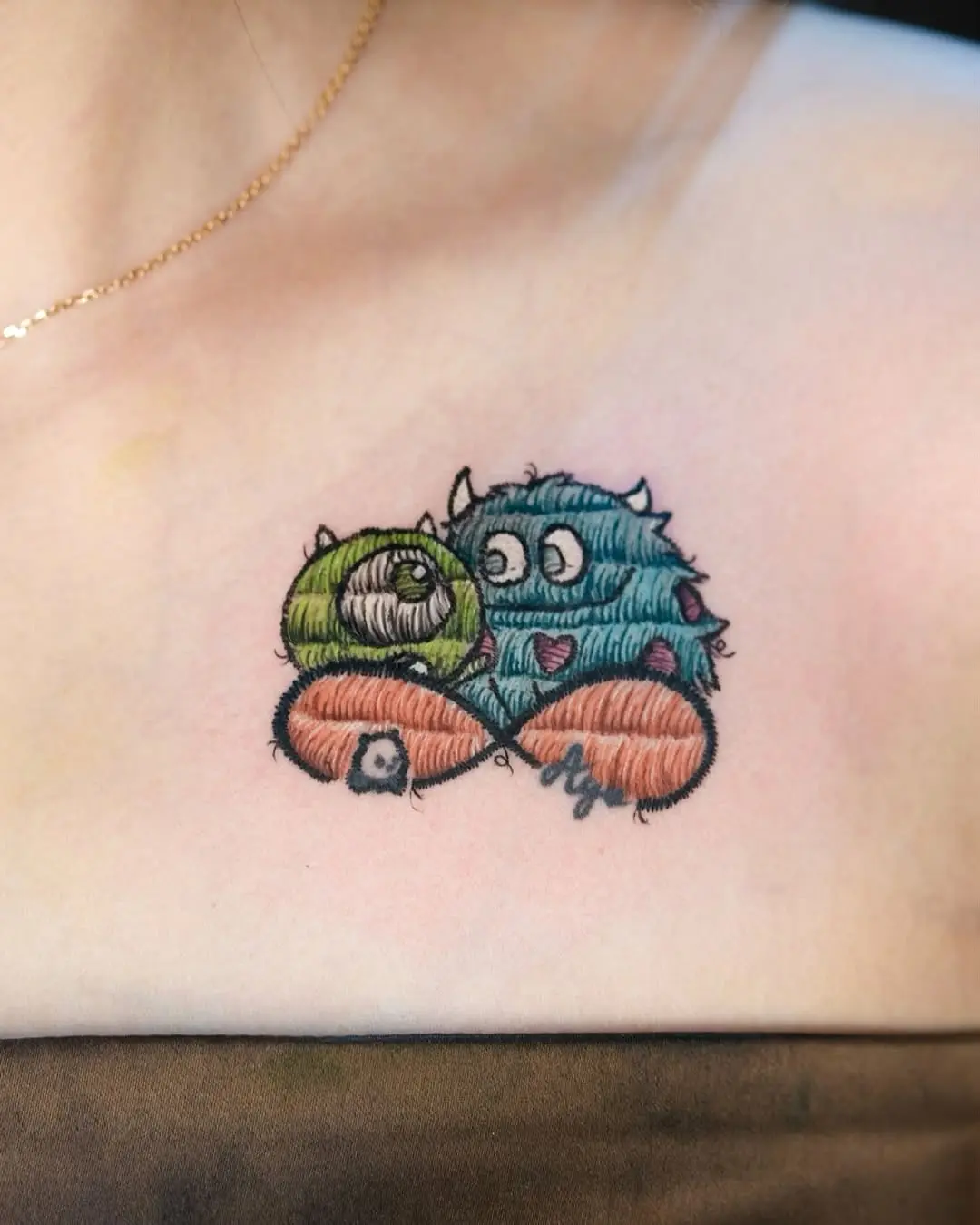 Cute stitched monster tattoos with vibrant colors