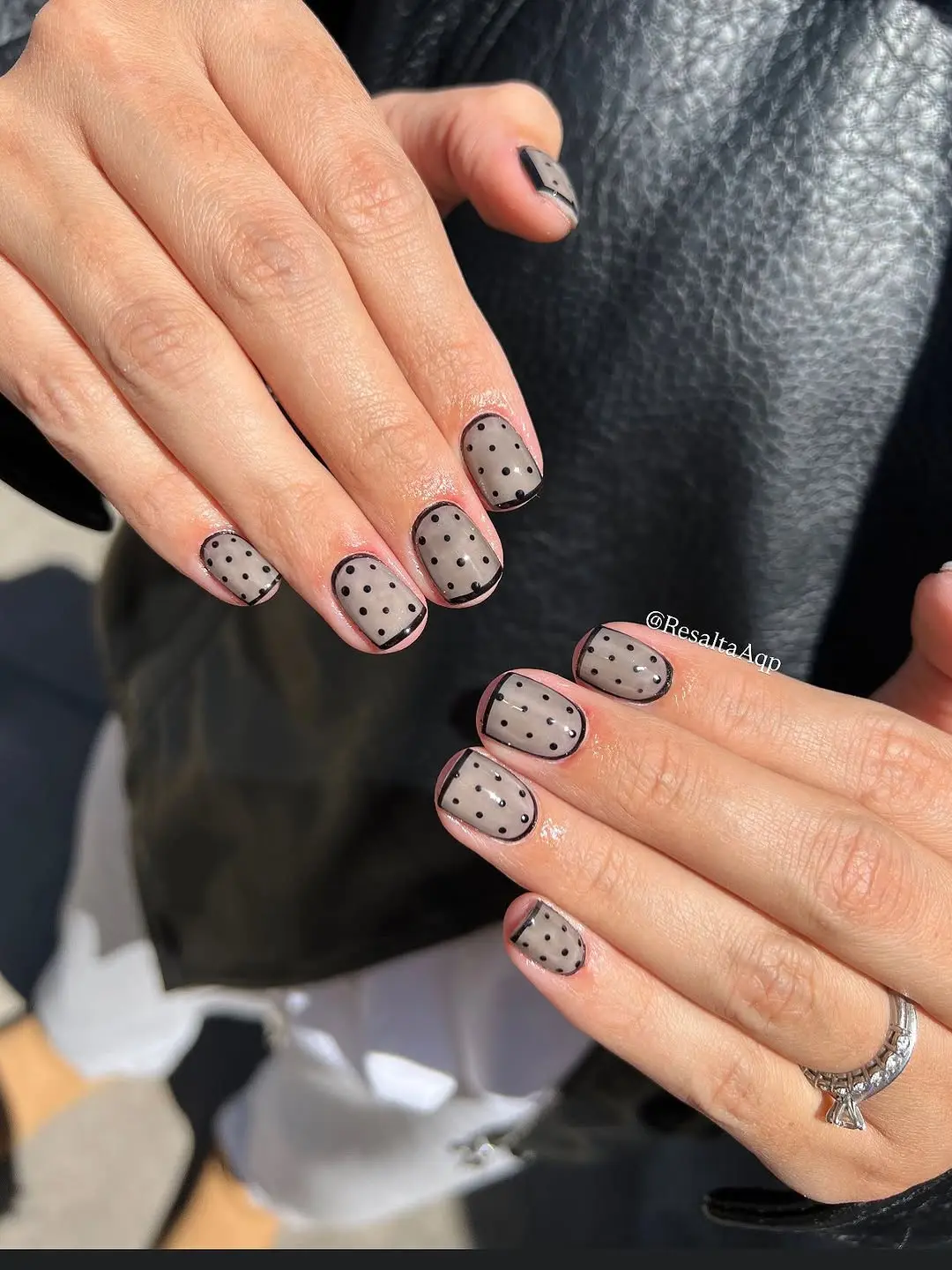 Chic black and translucent polka dot nails