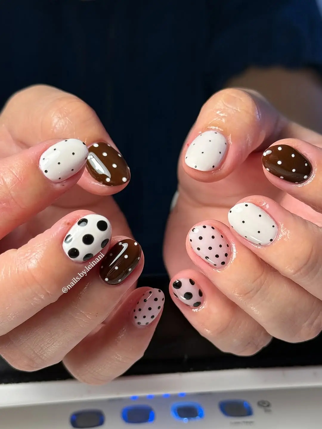 Chic polka dot manicure with earthy tones