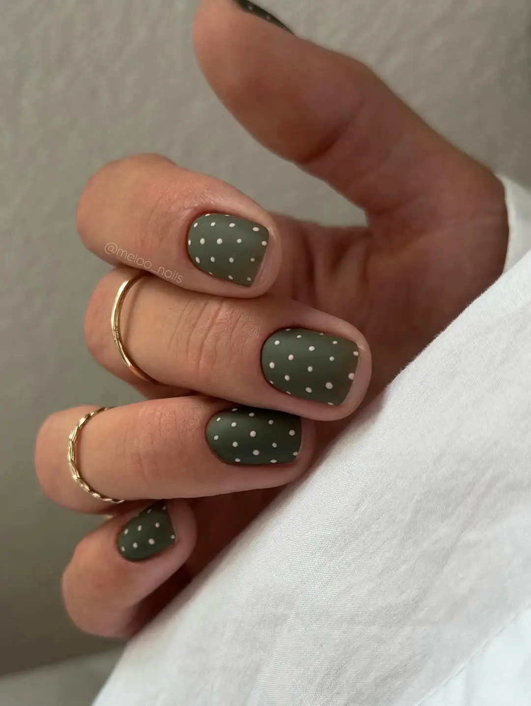 Chic Green Polka Dot Nail Design