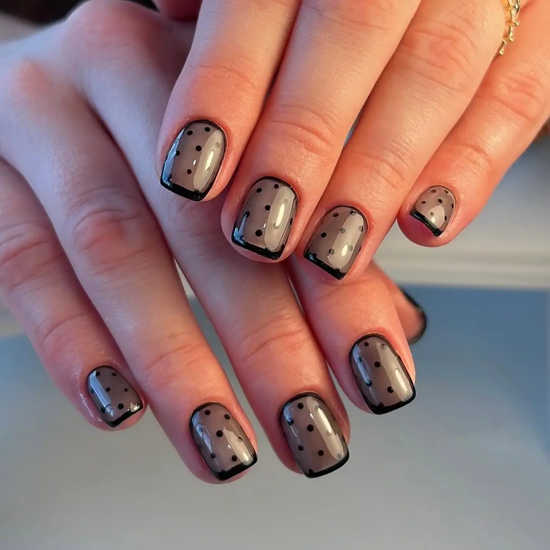 Elegant grey and black polka dot nails