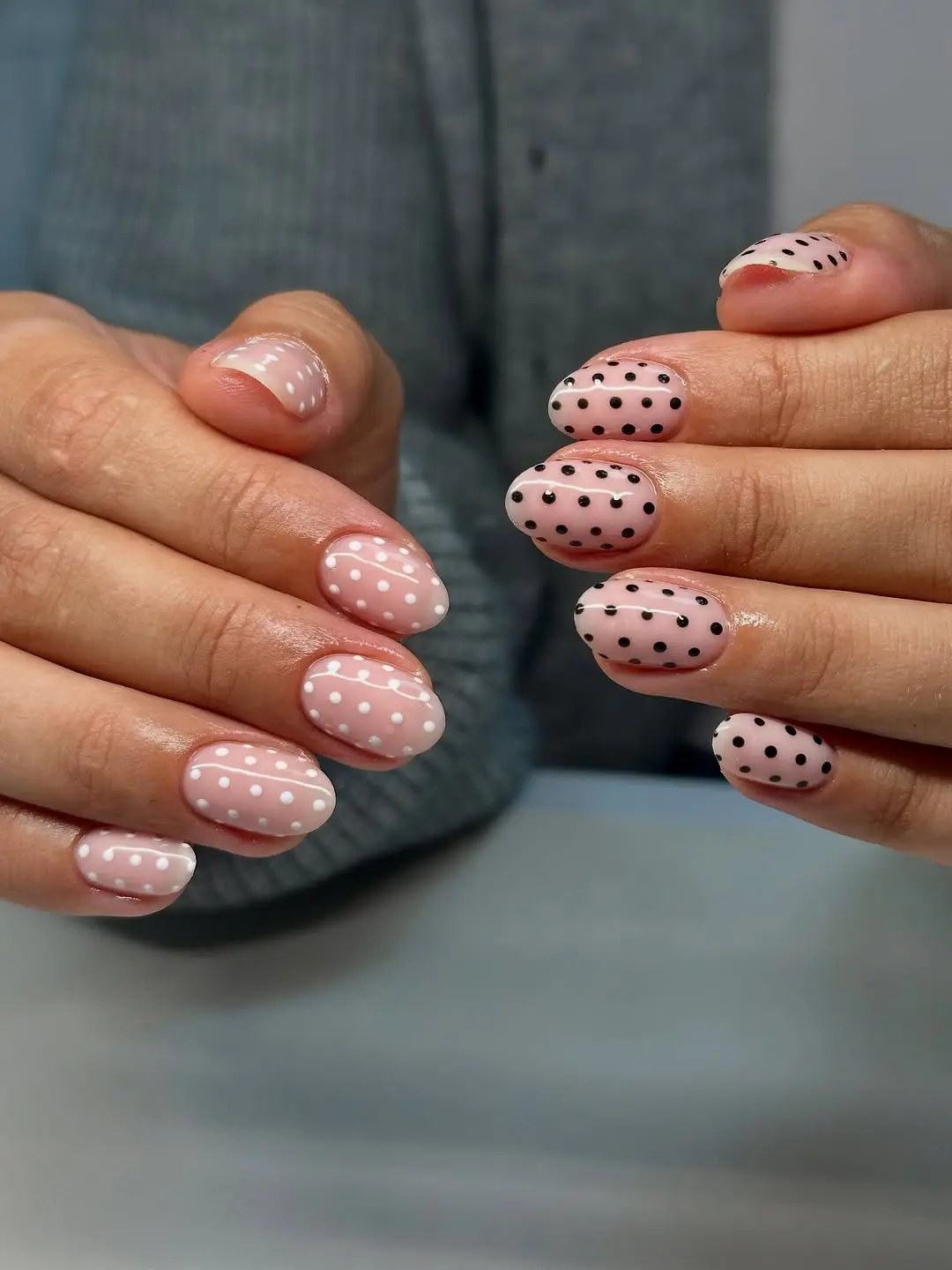 Charming pink and black polka dot nails