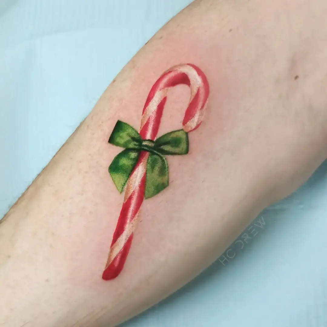 Whimsical candy cane with festive green bow