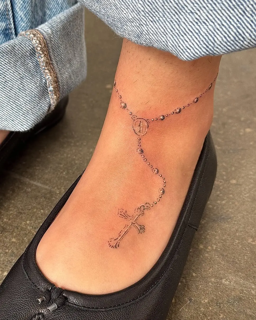Minimalist rosary tattoo on ankle inspiration