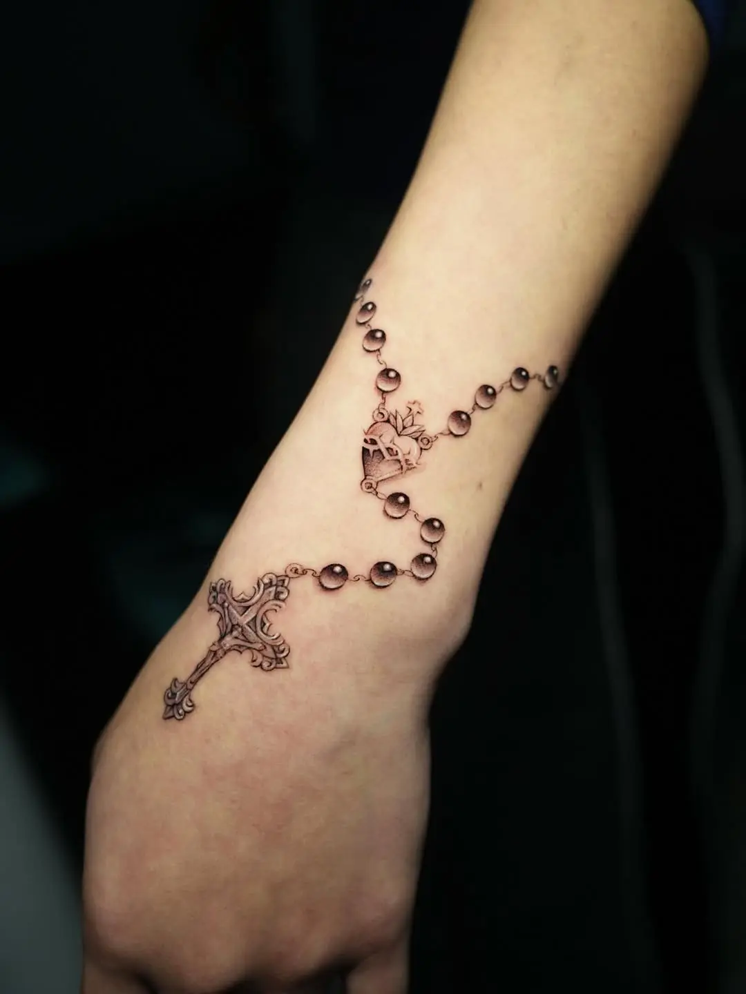 Elegantly Designed Rosary Tattoo on Wrist