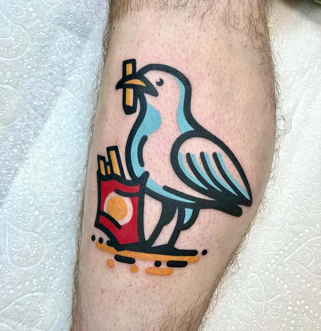 Playful seagull enjoying a snack tattoo design