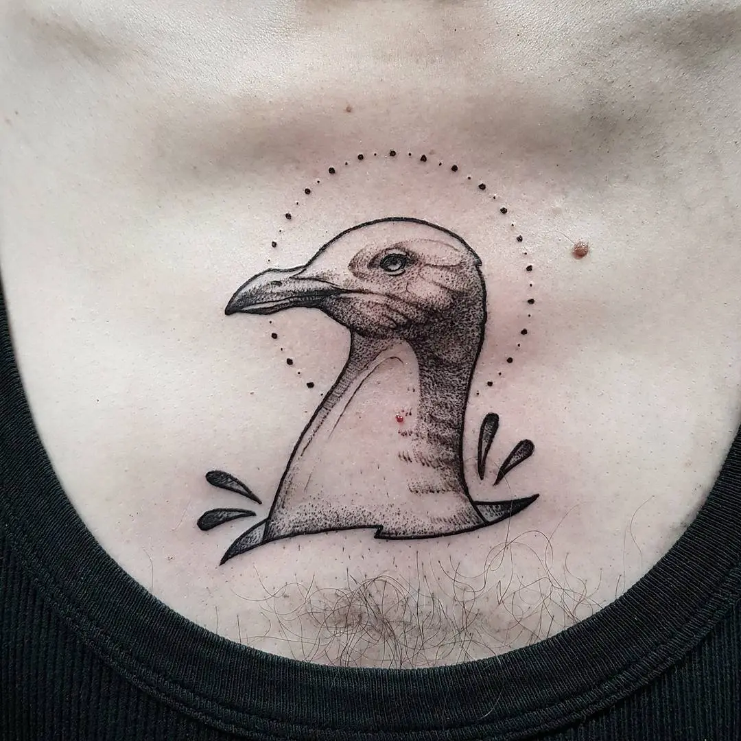 Stylish seagull tattoo with dotted halo