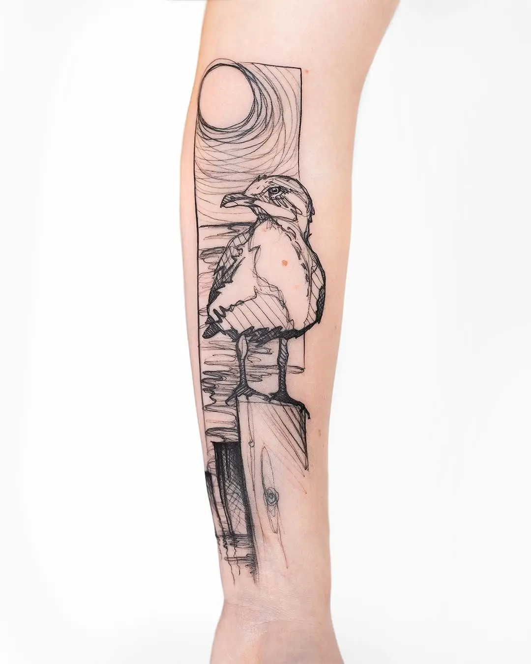 Elegant seagull tattoo with minimalist design
