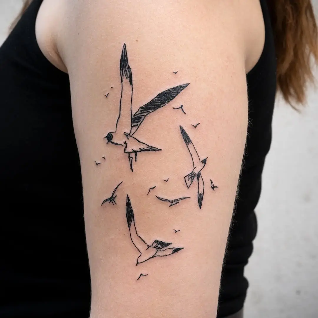 Elegant seagull tattoo capturing freedom in flight