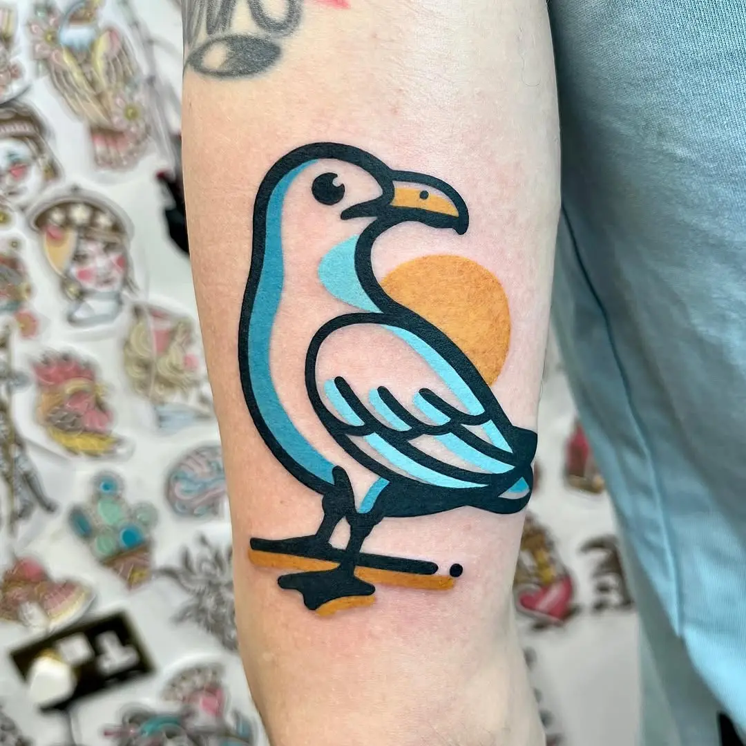 Vibrant Seagull Tattoo with Sunrise Elements