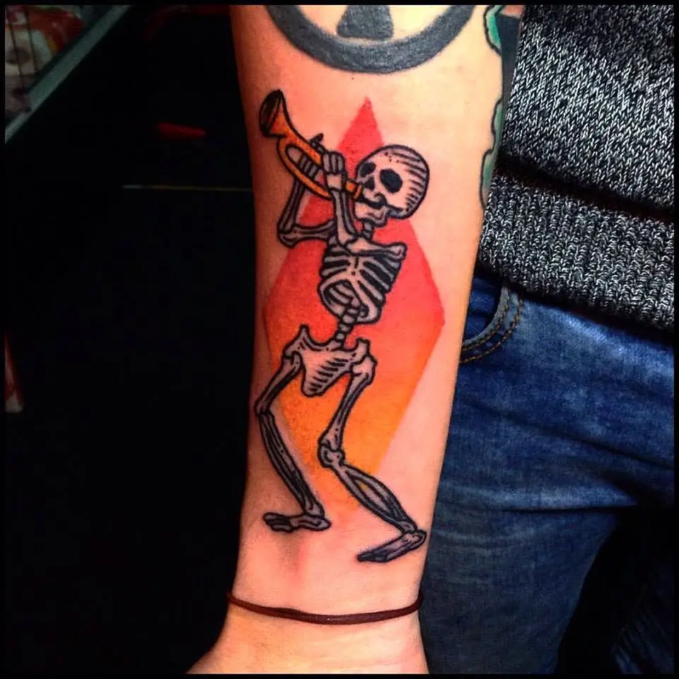 Whimsical jazz skeleton tattoo captures musical spirit