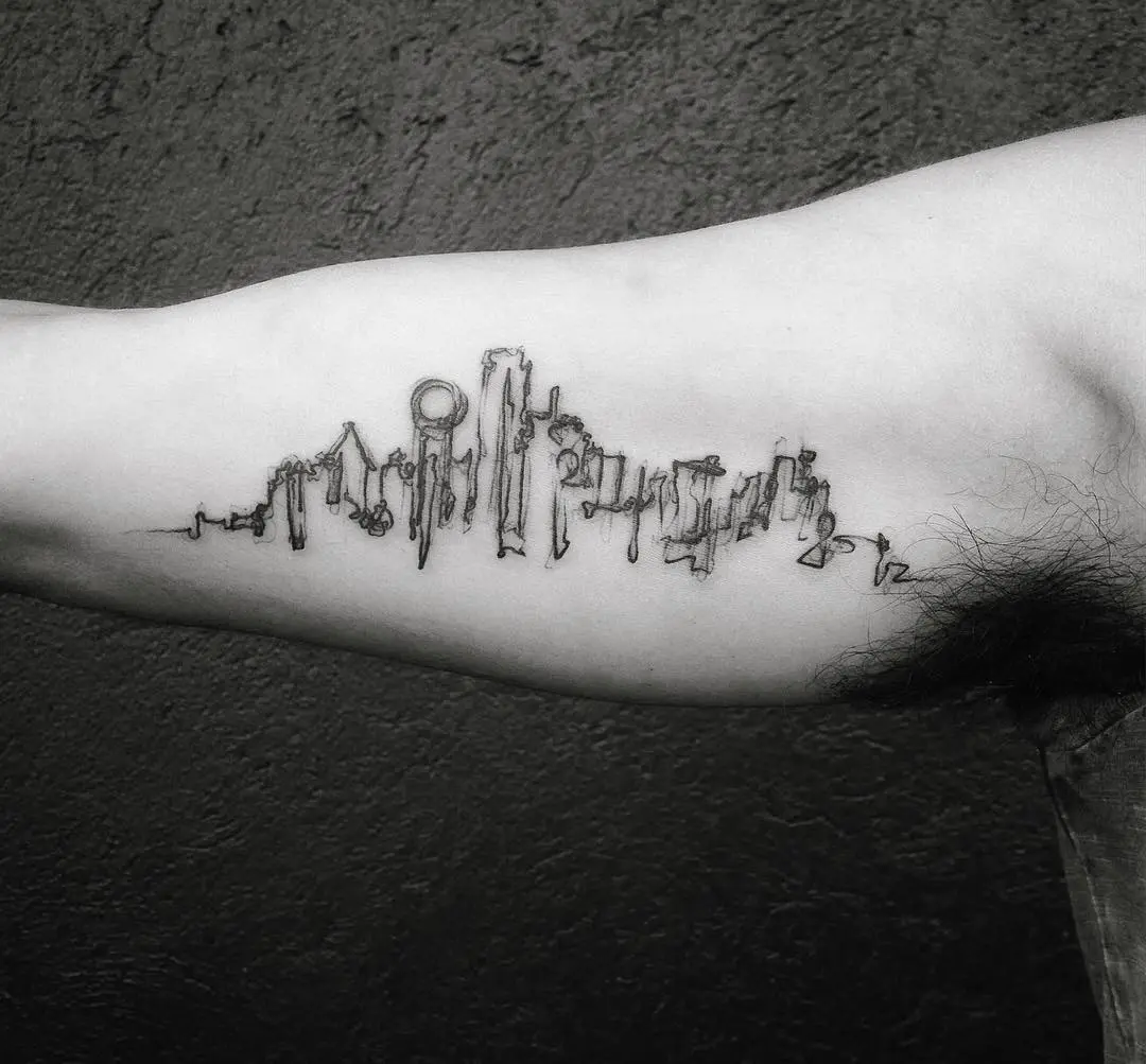 Minimalist skyline tattoo with urban flair