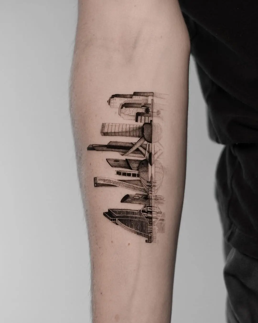 Stunning skyline tattoo in intricate black ink